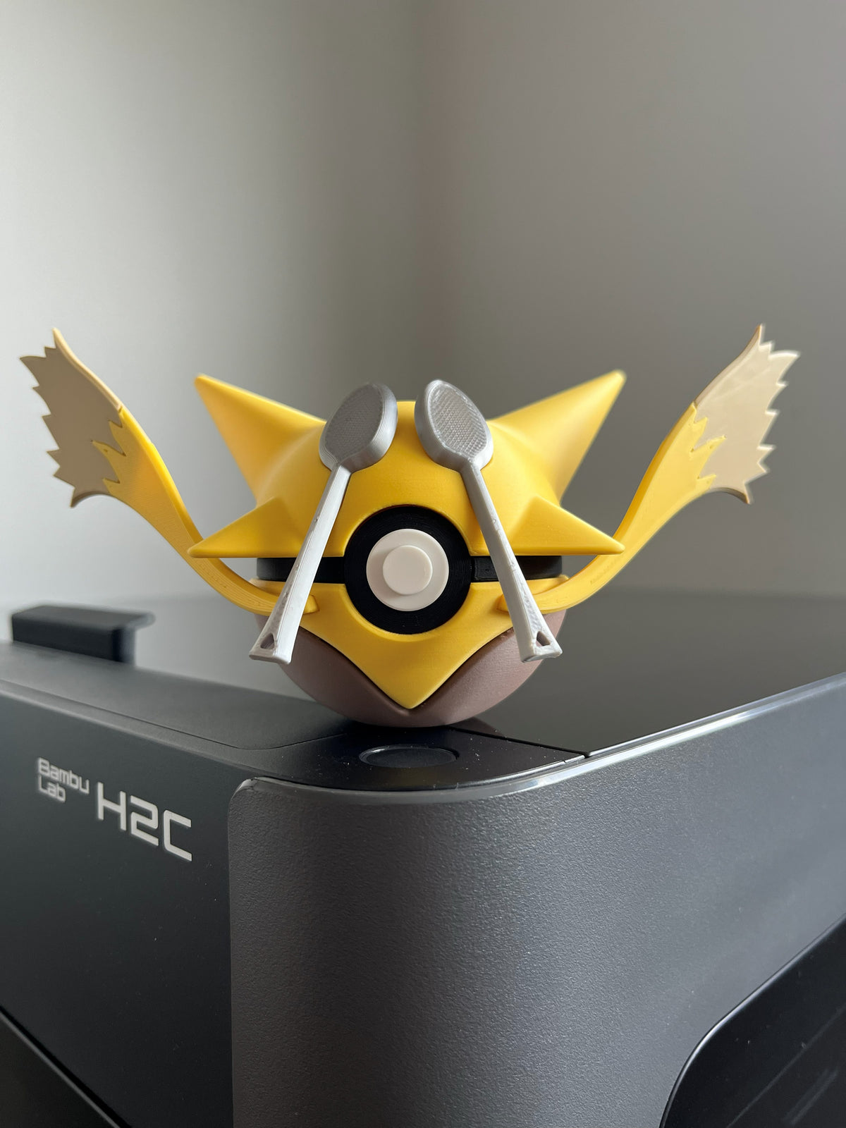 Alakazam Monster Ball, front view