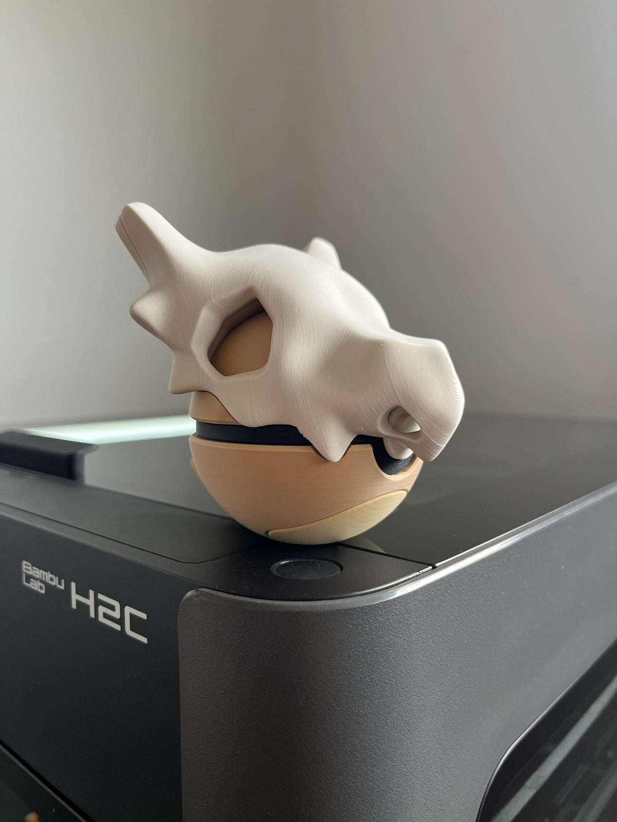 Cubone Monster Ball, side profile