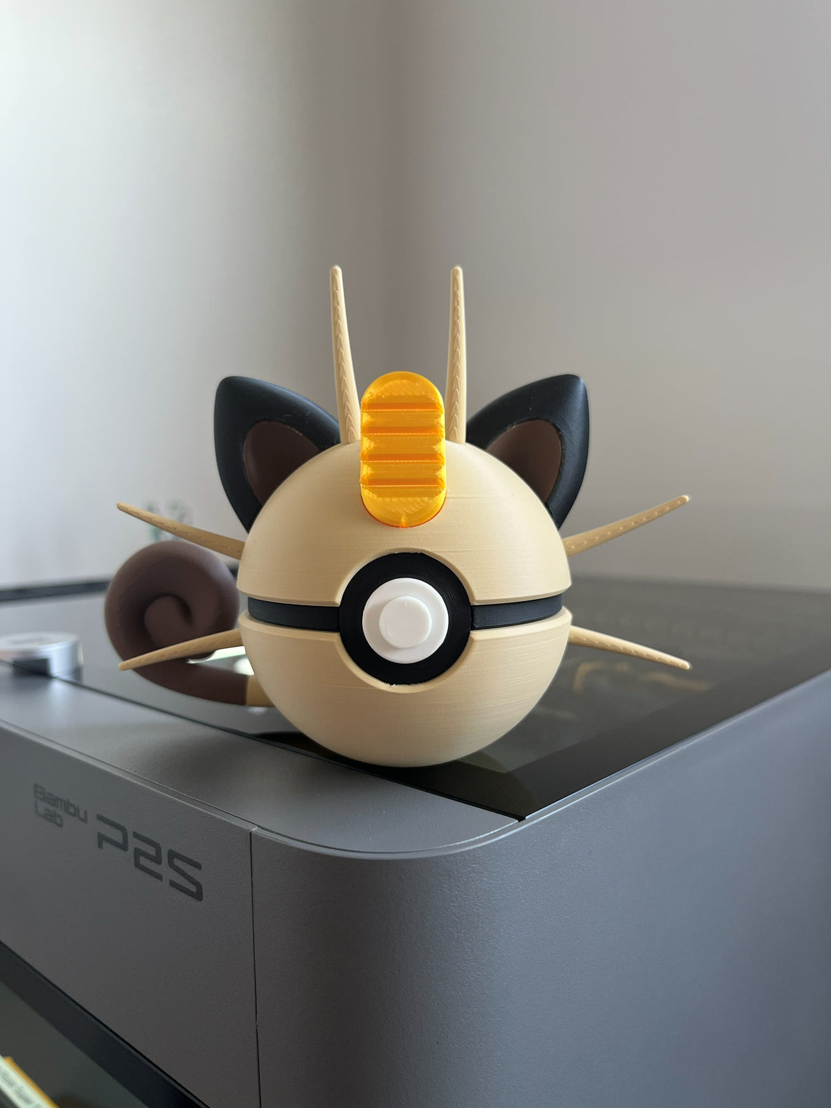 Meowth Monster Ball, front view