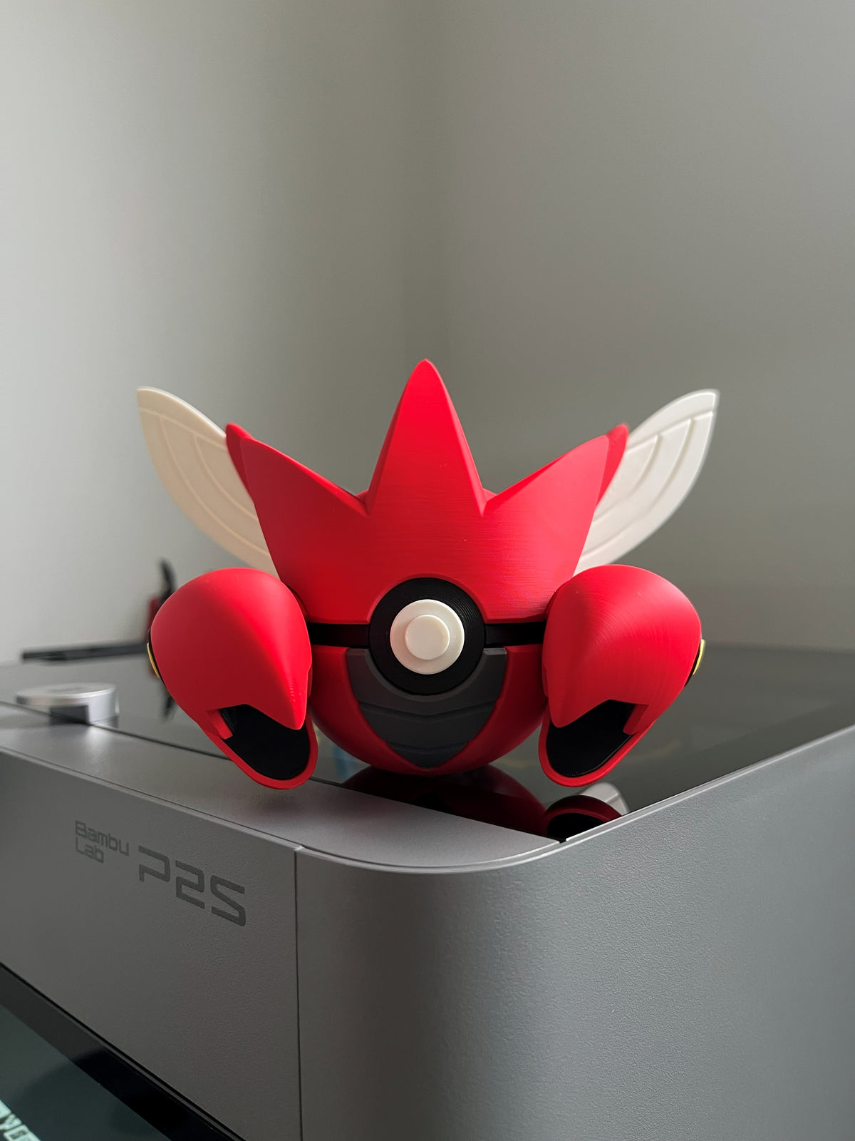 Scizor Monster Ball, front view