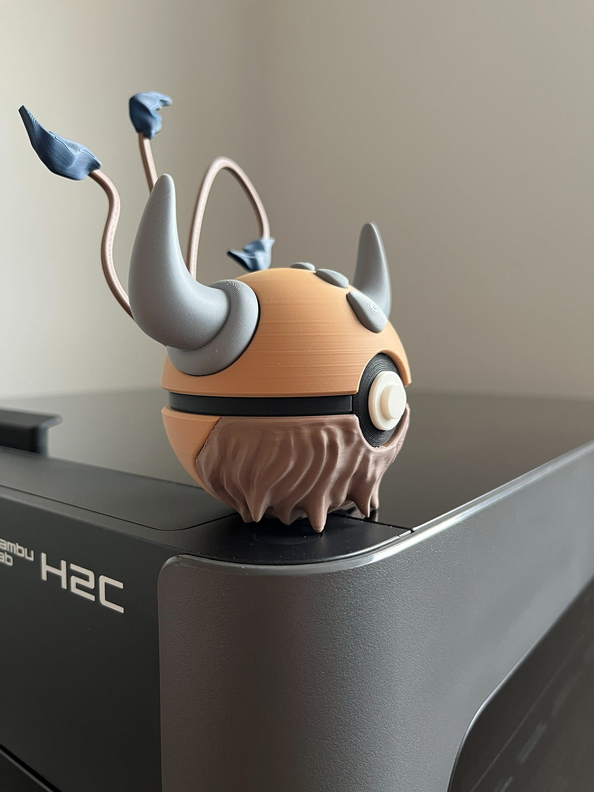 Tauros Monster Ball, side profile
