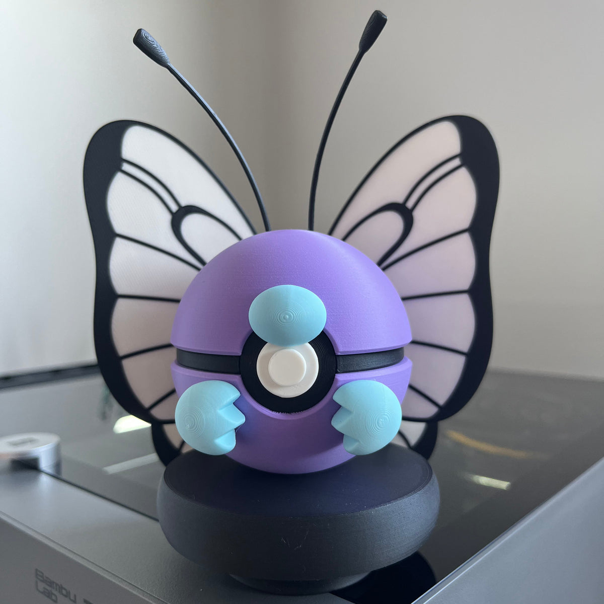 Butterfree Monster Ball, front view