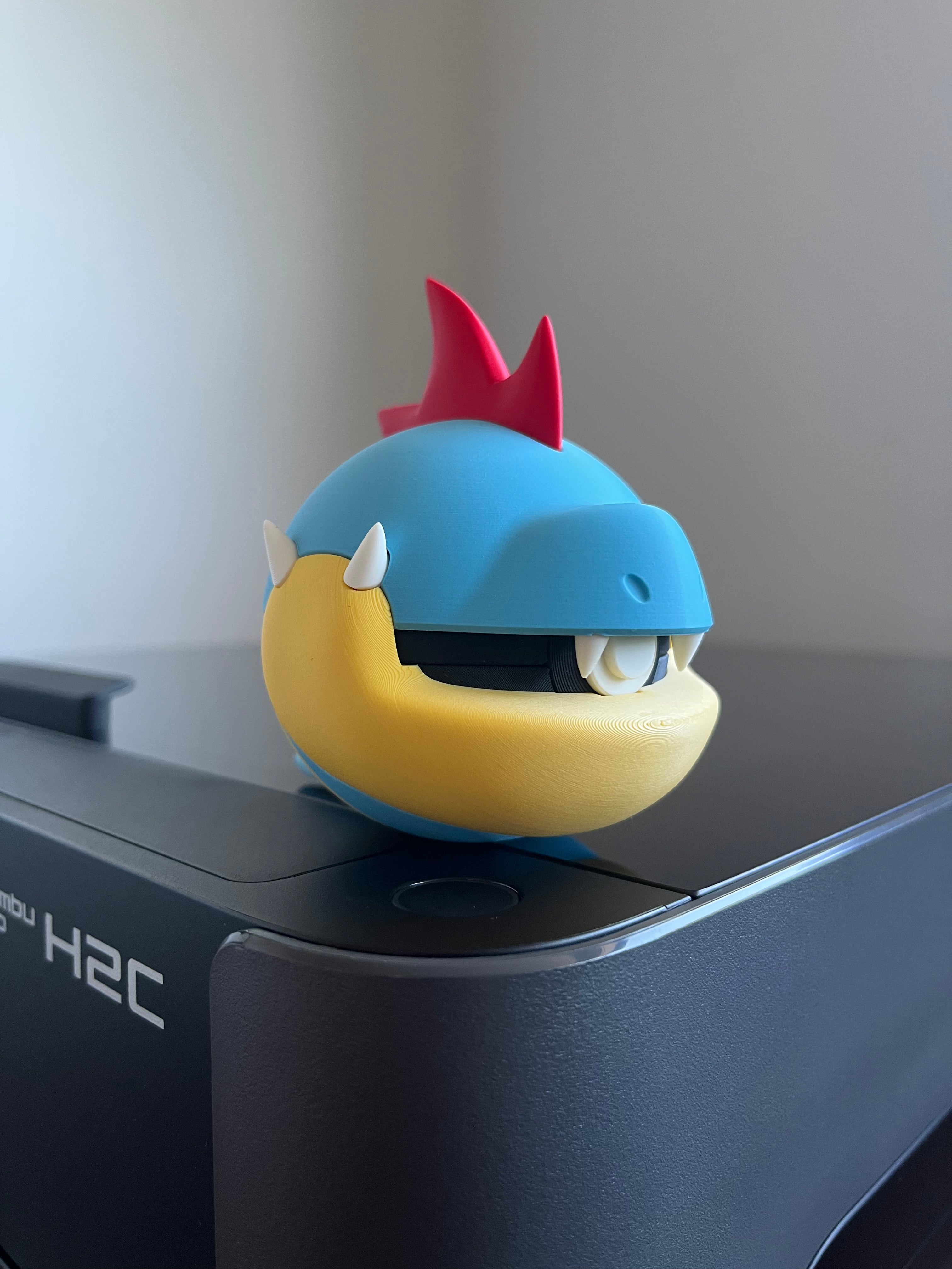 Croconaw Monster Ball, side profile