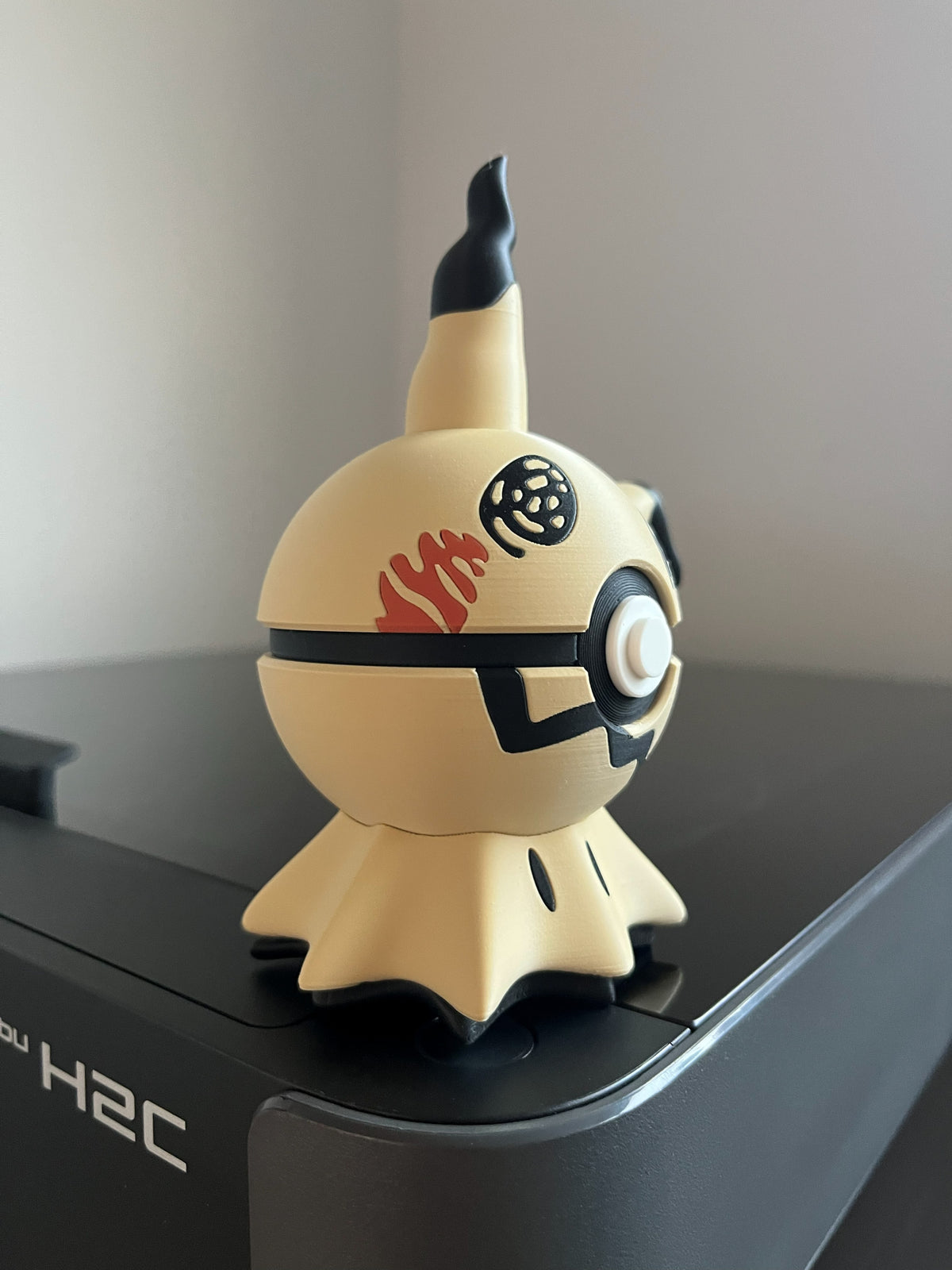 Mimikyu Monster Ball, side profile