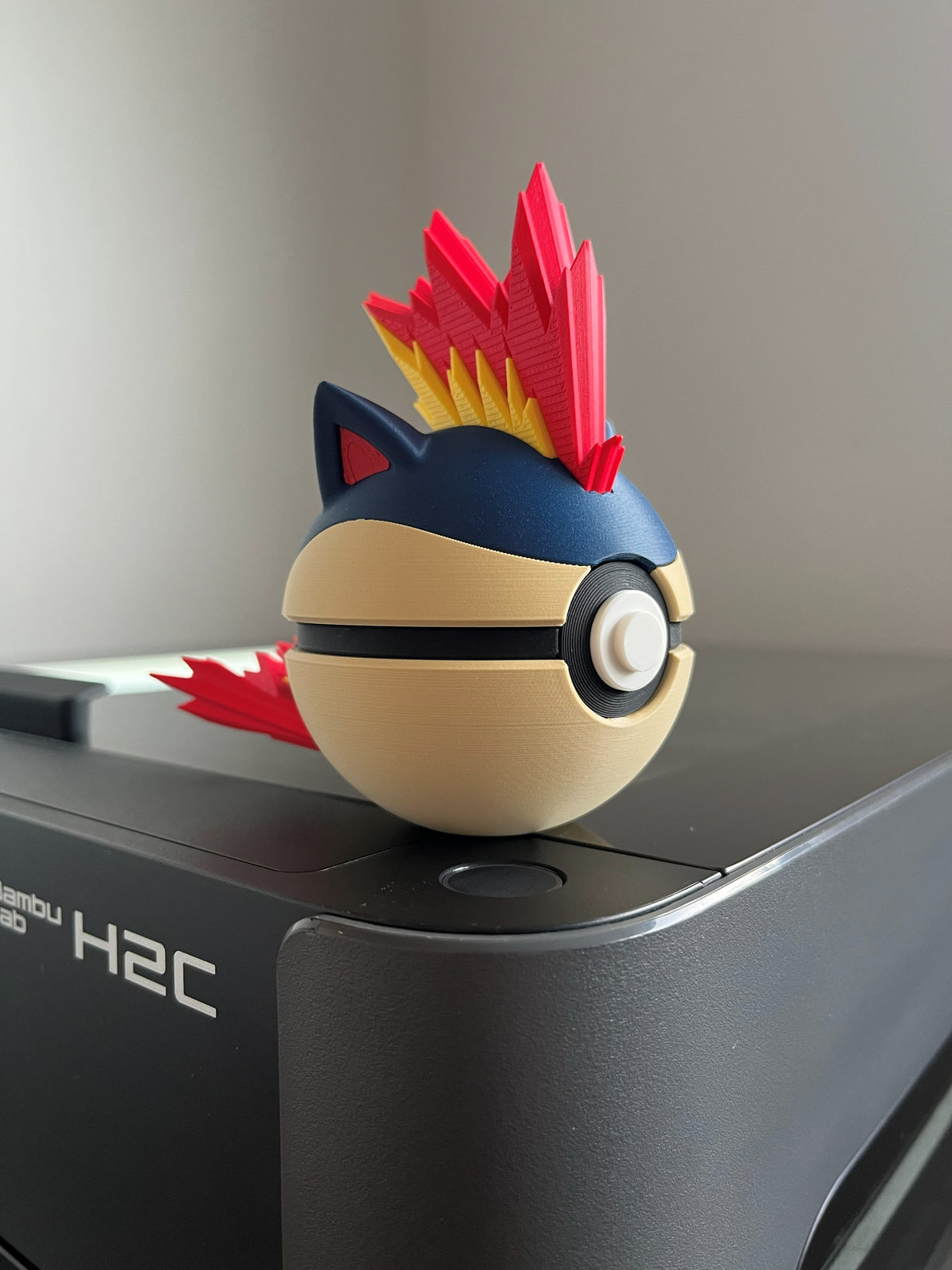 Quilava Monster Ball, side profile